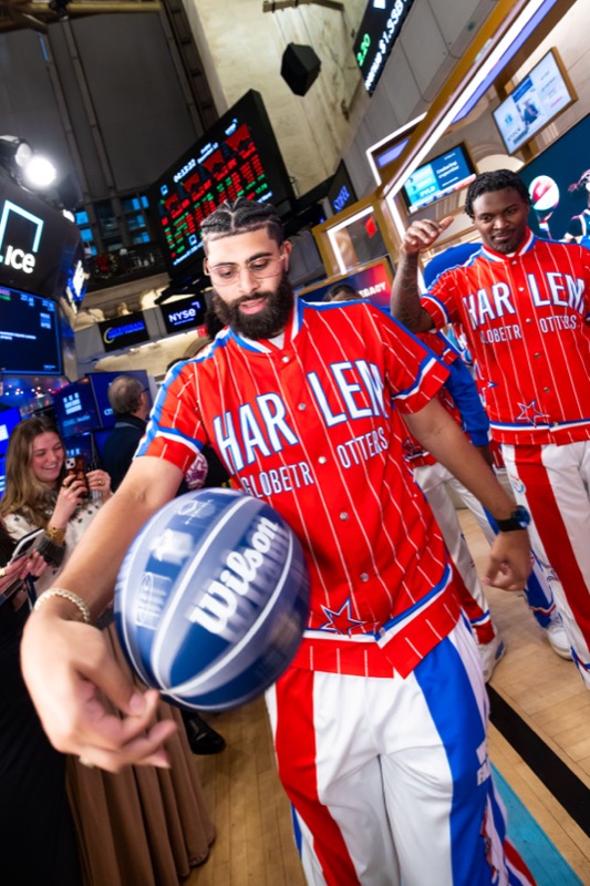 Lou Dunbar II at a public event with teammates